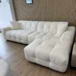 ספה מעוצבת בד בוקלה צבע שמנת 2 חלקים איכותית עם הדום - פרסטיגו